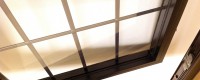 aluminium window in an oak frame