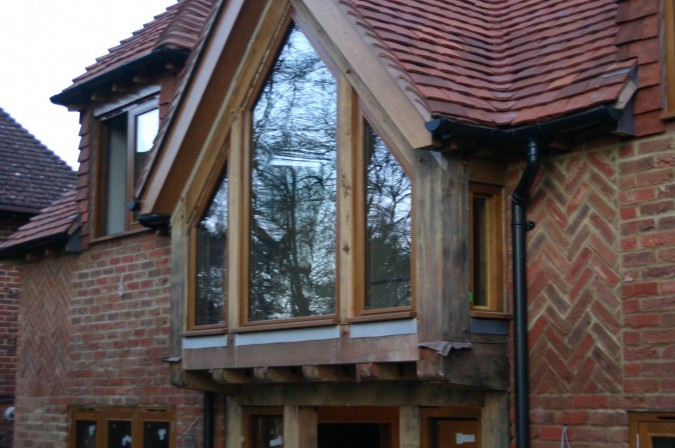 oak  windows fitted in a green oak frame